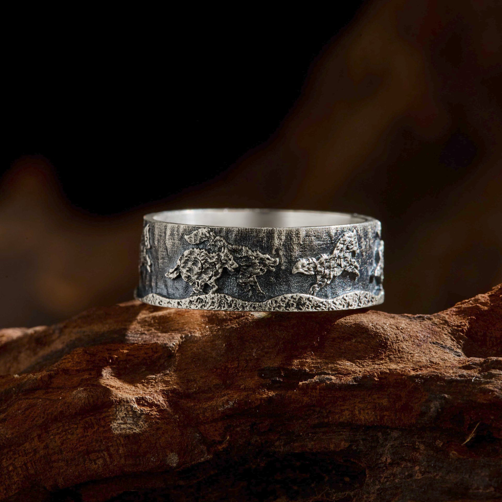 running-wolf-pack-sterling-silver-band-ring