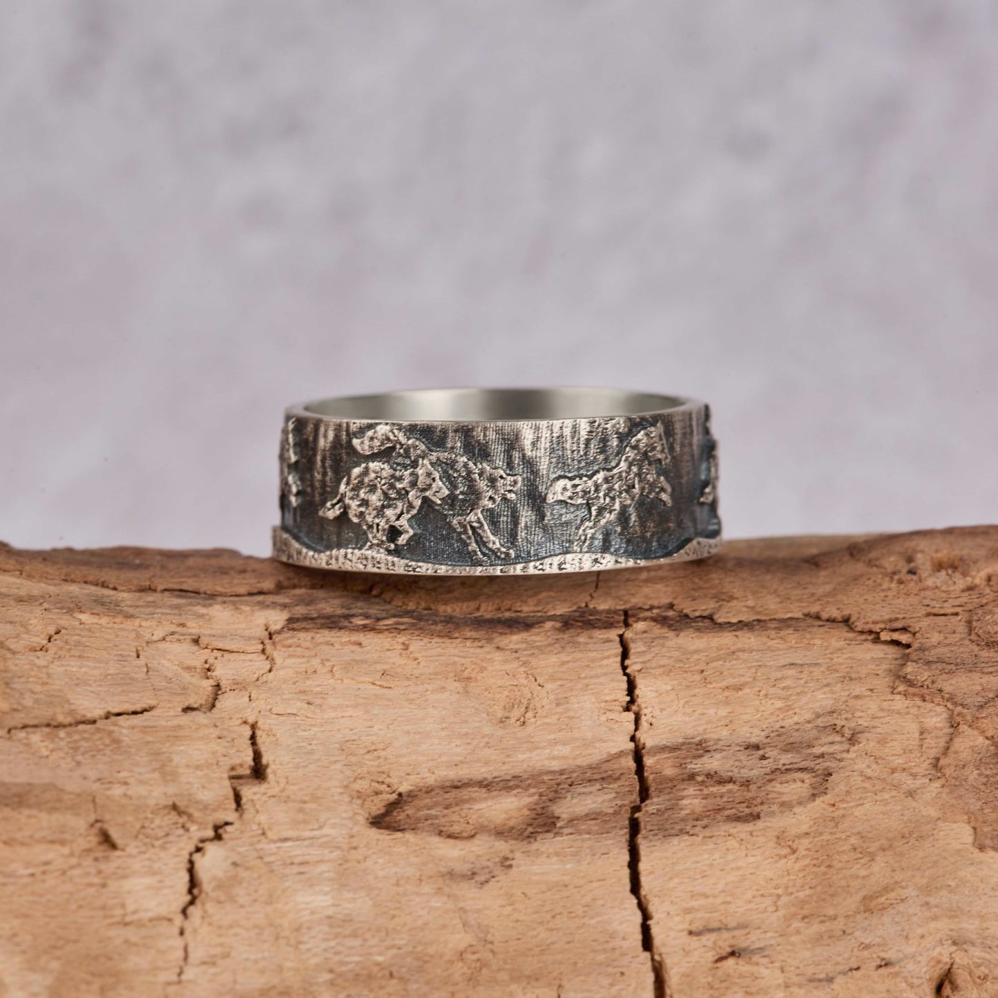 running-wolf-pack-sterling-silver-band-ring